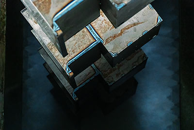 Parts preparing to pass through high-heat electric pressure wash with a multi-metal zirconium and acid etch for powder coating.
